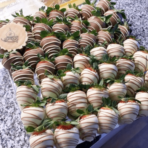 Milk and white dipped strawberries platter